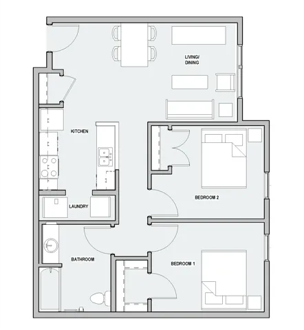 A floor plan with two bedrooms, a laundry room, a bathroom, a kitchen, and a living/dining area.
